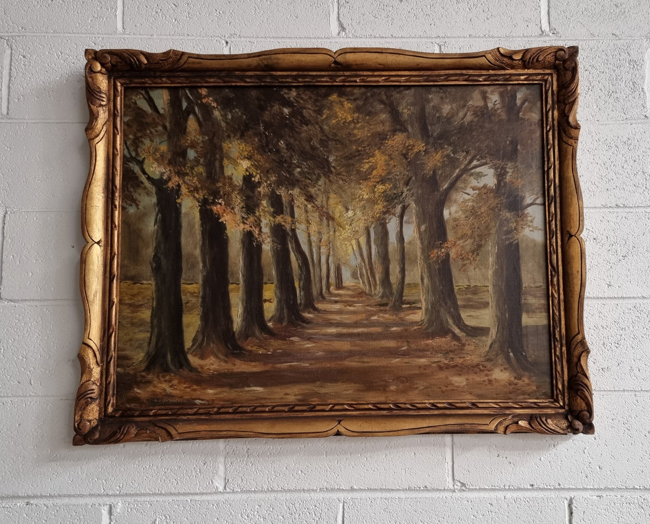 French signed oil on canvas depicting a charming landscape scene in a decorative gilt frame. It is in good original detailed condition and has been sourced from France.