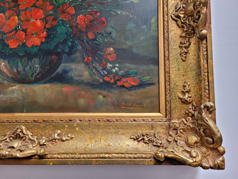 Signed oil on canvas of a charming floral arrangement in vase with ornate gilt frame. In good original detailed condition.