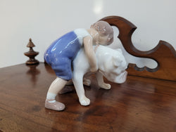 Two Friends Figurine 1790 Designed by Michaela Ahlmann for Bing & Grondahl (B&G) " Young boy hugging his patient Bulldog" | Antique & Vintage | Moonee Ponds Antiques | Australia Wide Delivery