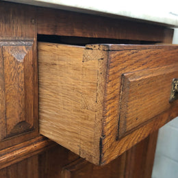 A lovely pair of French Oak, marble top bedside cabinets with a cupboard and drawer in good original condition.