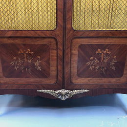 Beautiful 19th Century French Louis XV style Mahogany Blind Bookcase. This piece has lovely inlaid doors and ormolu mounts, marble top and four adjustable shelves. In good original detailed condition.