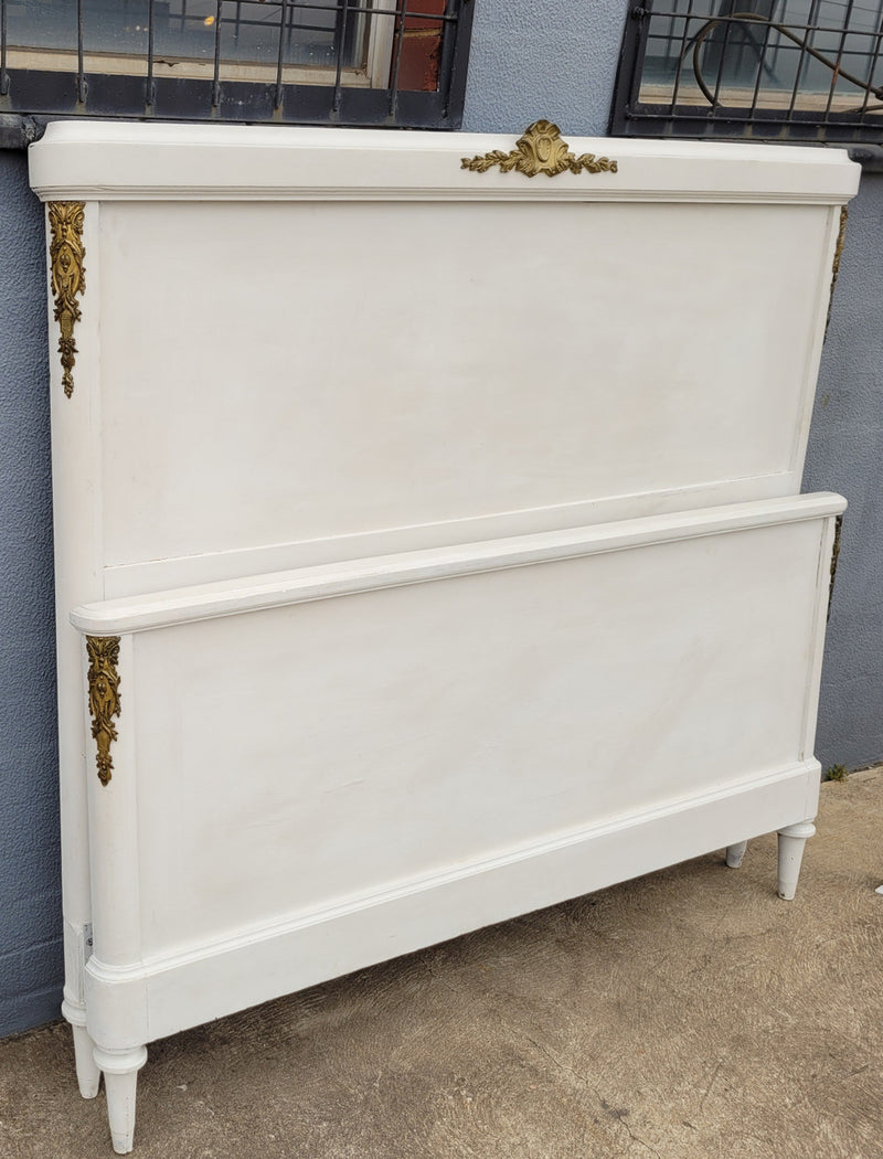 French Louis 16th style chalk painted queen size bed with gilt decorative mounts and includes custom slats. It has been sourced from France and in good original condition.