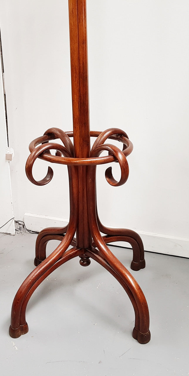A great example of an Antique French walnut stained Thonet style hat and coat stand in very good restored condition. Very sturdy and solid. Hard to find. Circa 1900.