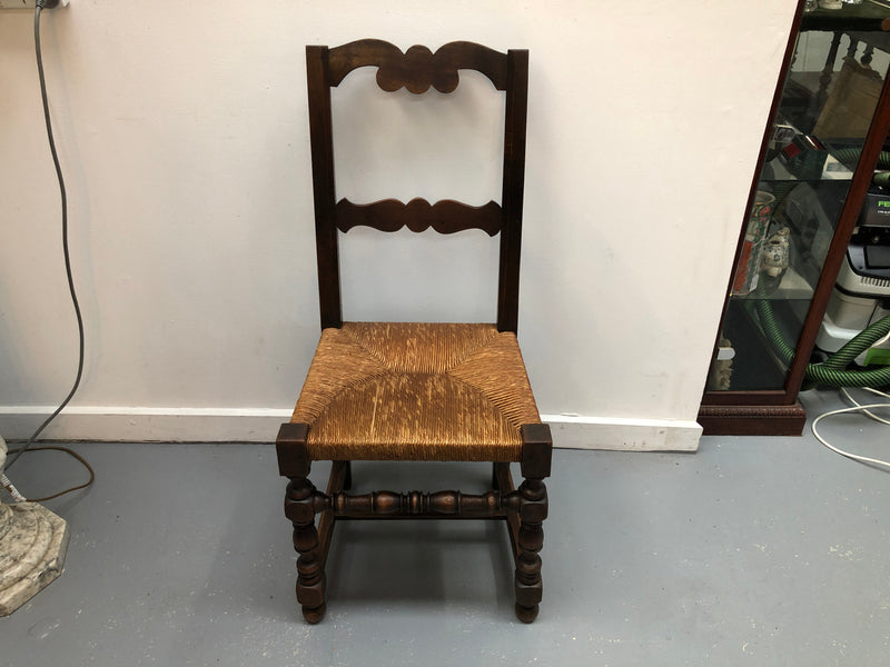 Set of 10 French Fruitwood rush seat dining chairs. They are in good original condition please view photos as they help form part of the description.