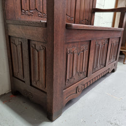 Decorative and nicely carved French Oak 19th Century hall seat with lift up lid for storage. Beautiful details and in good original detailed condition.