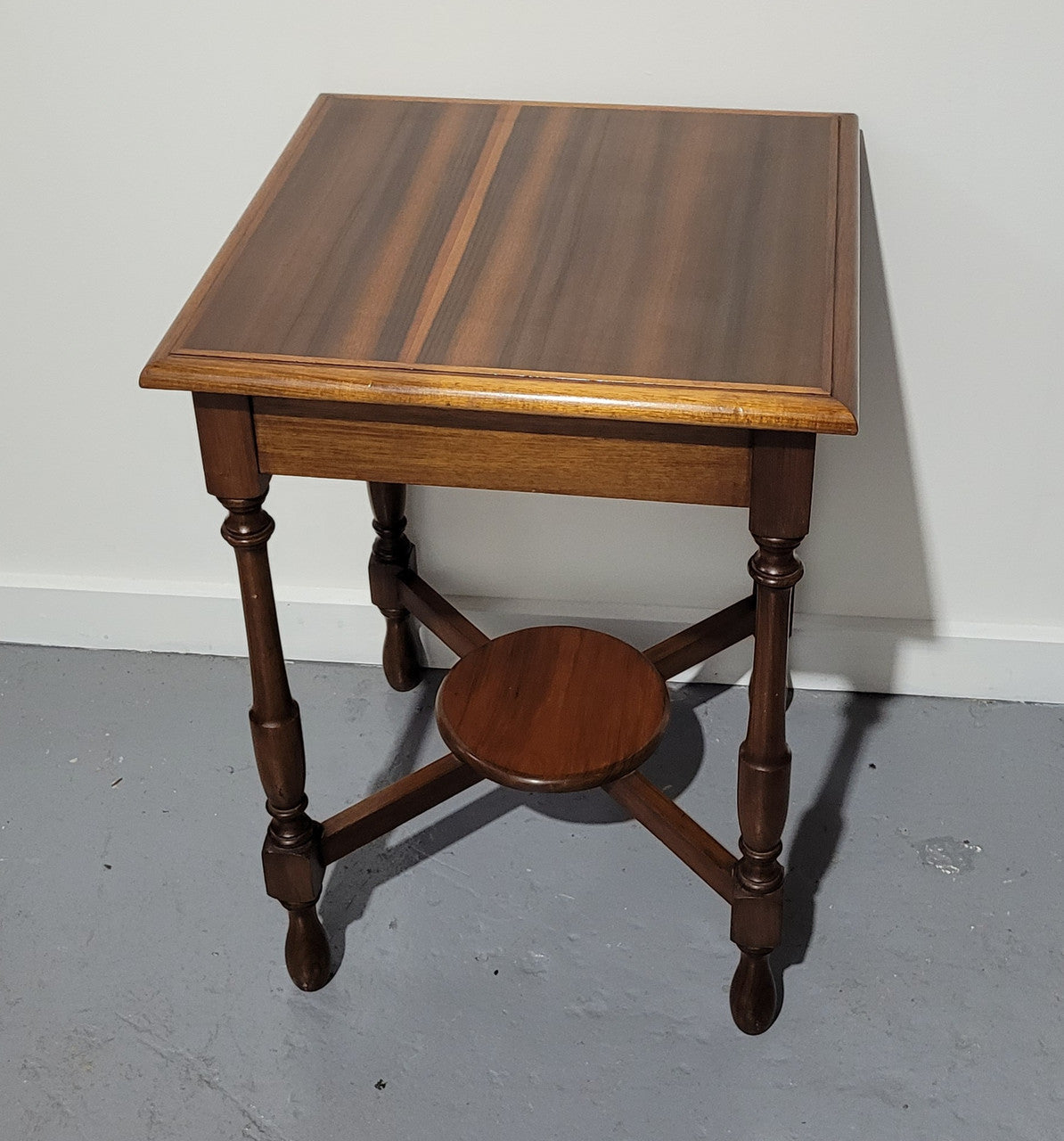 Beautiful art deco walnut occasional table. In good original detailed condition.