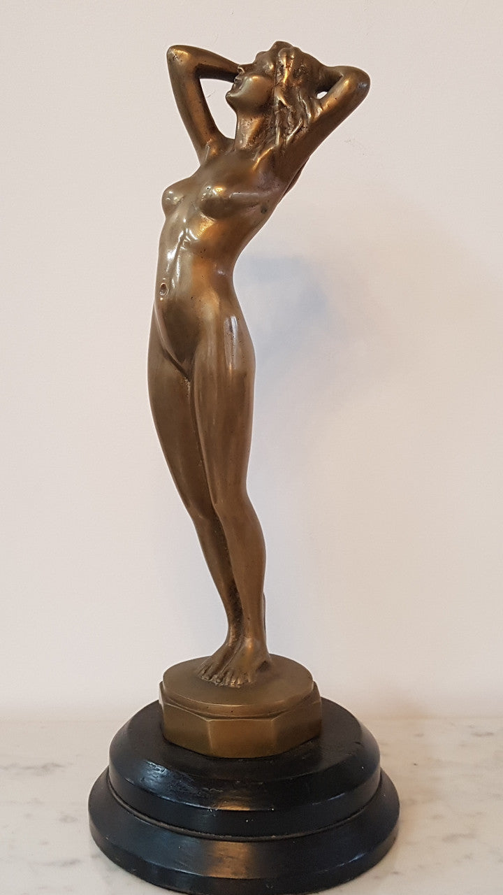 Here we have a lovely circa 1930's solid Art Deco bronze statue of a female on a wooden base. In good original condition.