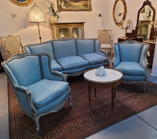 Well Proportioned Louis XV Salon Suite consisting of well proportioned 3 seater down cushioned, winged settee with 2 matching bergere chairs. All upholstered in stunning blue self stripe fabric. In excellent condition. Circa: 1930's.
