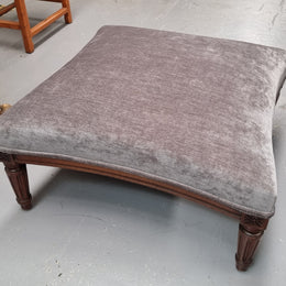 Amazing French Louis 16th Style large walnut footstool with new grey upholstery.  Circa: 1900. In good detailed condition.