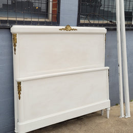 French Louis 16th style chalk painted queen size bed with gilt decorative mounts and includes custom slats. It has been sourced from France and in good original condition.