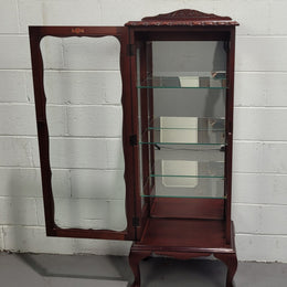 Vintage Mahogany petite display cabinet with three solid glass shelves. Ideal for a small area and is in good original detailed condition.