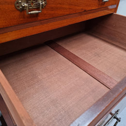 Lovely Antique English walnut tallboy/ chest of drawers. There are five drawers which all differ in sizes and have lovely hardware. It is in good original detailed condition.