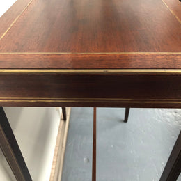 Elegant rectangular mahogany French brass inlaid occasional table. Is in good original condition.