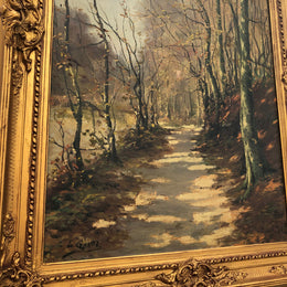 Beautiful Antique French oil on canvas of a path of trees, in a fabulous ornate frame and in good condition.