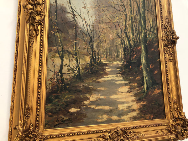 Beautiful Antique French oil on canvas of a path of trees, in a fabulous ornate frame and in good condition.