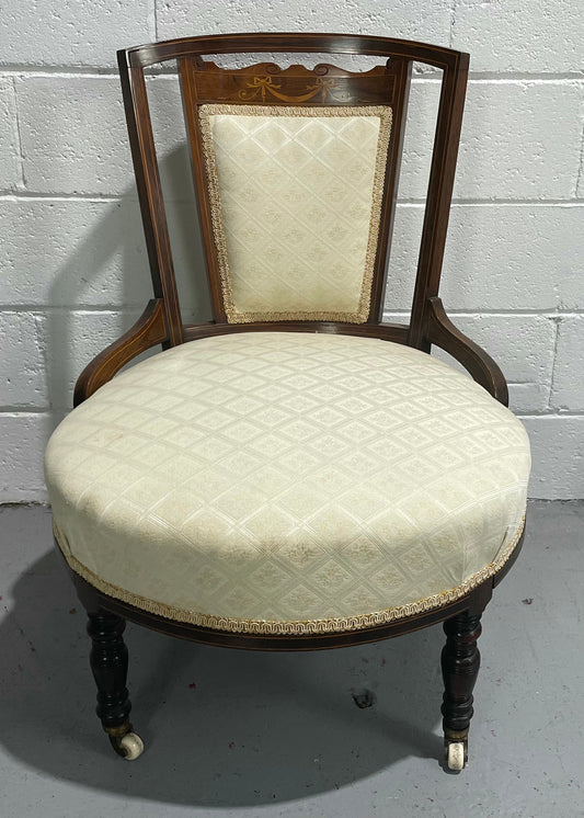 Edwardian Sheraton Inlaid upholstered round bedroom chair. In good original condition and the fabric is in used condition, please view photos as thy help form part of the description.