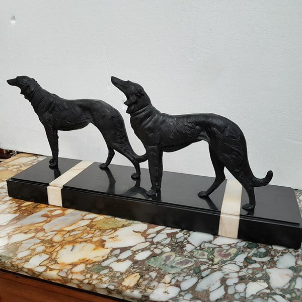 French Art Deco cold painted spelter, group of two hounds standing on a beautiful piece of marble base. Signed by Leduc and in good original condition.