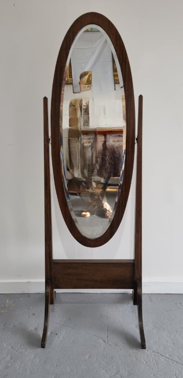 Lovely simple Antique Walnut cheval mirror with original bevelled mirror. In good original detailed condition.