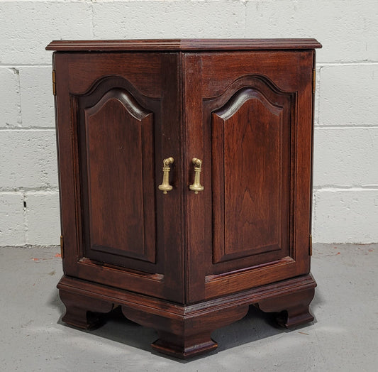 Hexagonal Mahogany enclosed side cabinet with two doors. Would make an ideal side cabinet and is in good restored condition.
