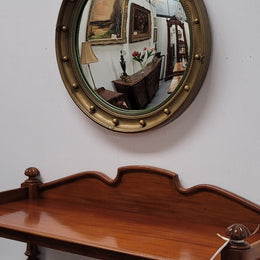 Large round French gilt framed convex mirror. It is a hard to find size with a total diameter of 67 cm. It has been sourced from France and is in good original condition.