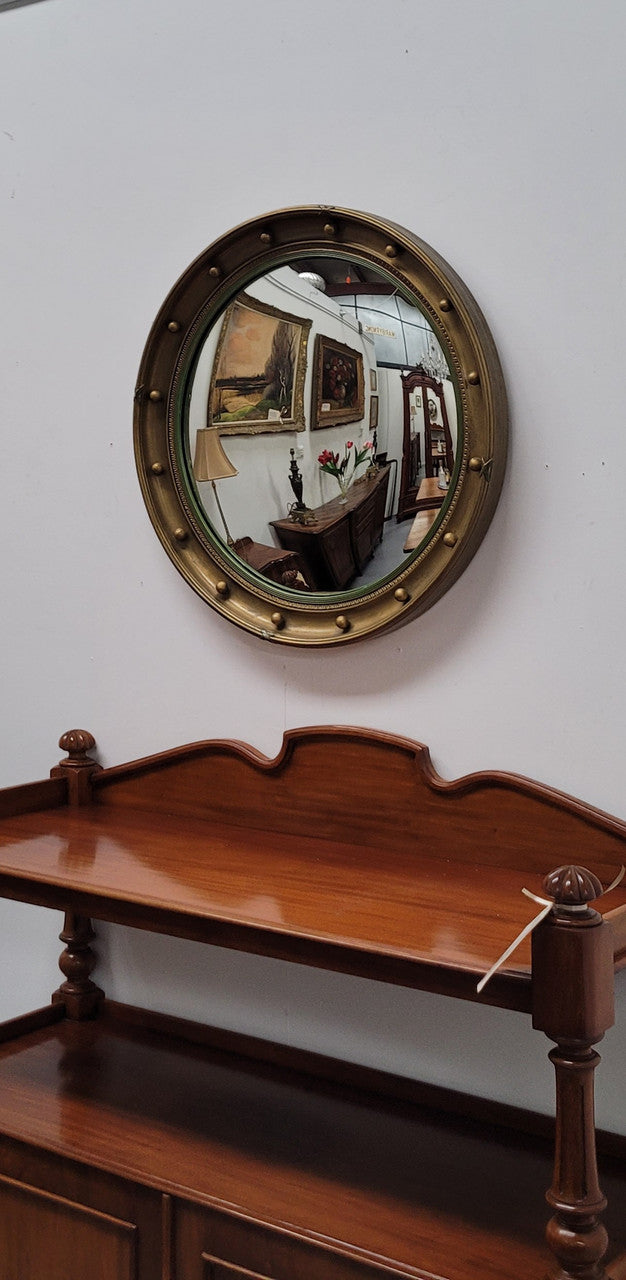 Large round French gilt framed convex mirror. It is a hard to find size with a total diameter of 67 cm. It has been sourced from France and is in good original condition.