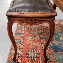 Impressive French Louis 15th style walnut upholstered duet leather stool. Very Good Condition.  Circa: 1930’s, sourced in France.