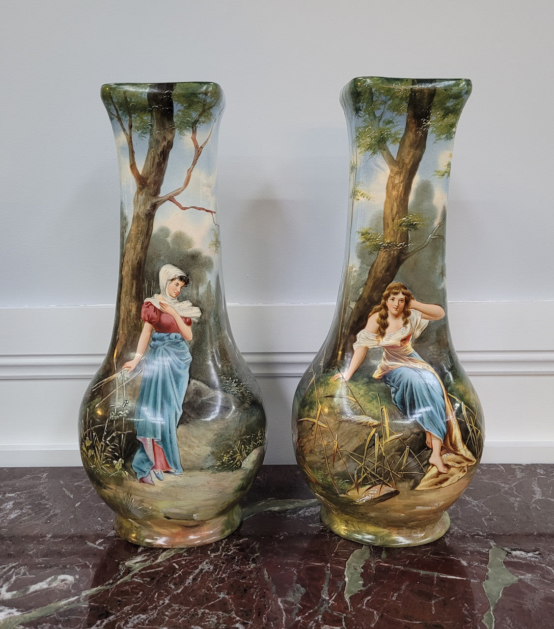 Pair of Victorian hand painted decorative vases depicting women. Please view photos as they help form part of the description.