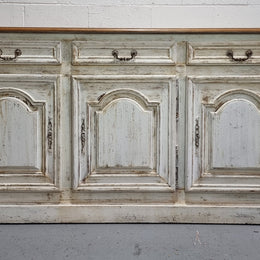 19th Century French painted three door oak buffet. Plenty of storage space with three drawers and doors. In good original condition.