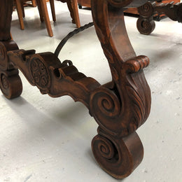 French Oak Renaissance style extension table with a lovely parquetry top and decorative carved and iron base in good original detailed condition.