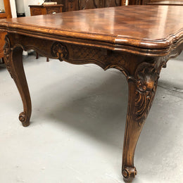 High quality French Oak Louis XV Style, beautifully carved extension table. It has an amazing parquetry top and when fully extended measures to 3 meters long. In very good original detailed condition.