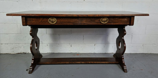 French dark Oak two drawer console table. It has loads of character and is in good original detailed condition.