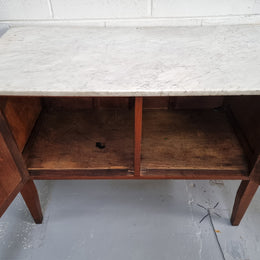 Blackwood two door white marble top cabinet. This would be ideal to be used as an entertainment unit, a TV stand or TV cabinet. In good original condition.
