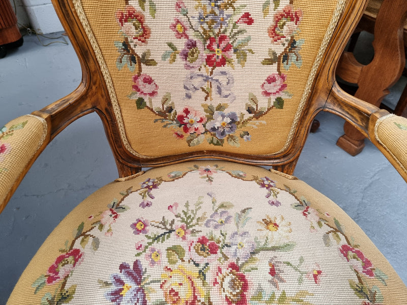 Louis XV style Walnut and tapestry armchair. Very comfortable to sit in and tapestry is in good original used condition.