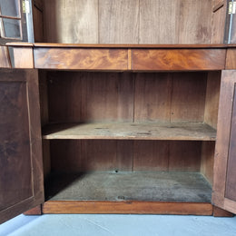 Rare early Australian colonial full Cedar bookcase. Plenty of storage underneath and glass top doors open up too three fully adjustable shelves. In good restored condition.