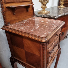 Single Louis 15th Inset marble bedside cabinet. It has a fully marbled interior and a wooden shelf on top. In good original detailed condition.