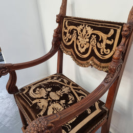 Beautifully carved Walnut Egyptian Revival armchair with amazing hand sewn Stumpwork embroidery coverings. In good original detailed condition.