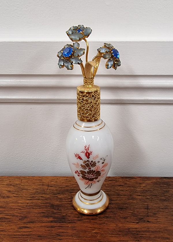 Lovely Vintage milk glass and hand painted perfume bottle with gilt, in good condition.