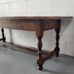 Rustic French Oak pedestal base coffee table. It is in good original detailed condition.