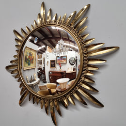 Stunning Vintage starburst convex mirror. It has been sourced from France and in good original detailed condition.