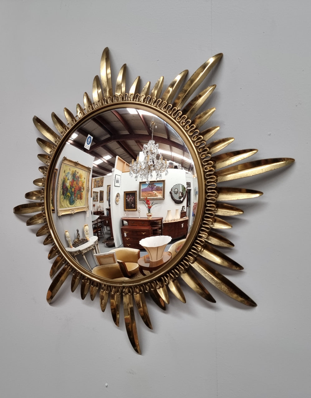 Stunning Vintage starburst convex mirror. It has been sourced from France and in good original detailed condition.