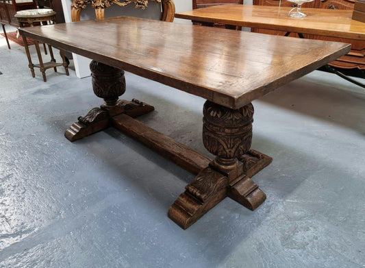 A beautifully carved 19th Century French Oak farmhouse table with a "bulbous base". It is in very good original detailed condition.