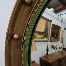 Large round French gilt framed convex mirror. It is a hard to find size with a total diameter of 67 cm. It has been sourced from France and is in good original condition.