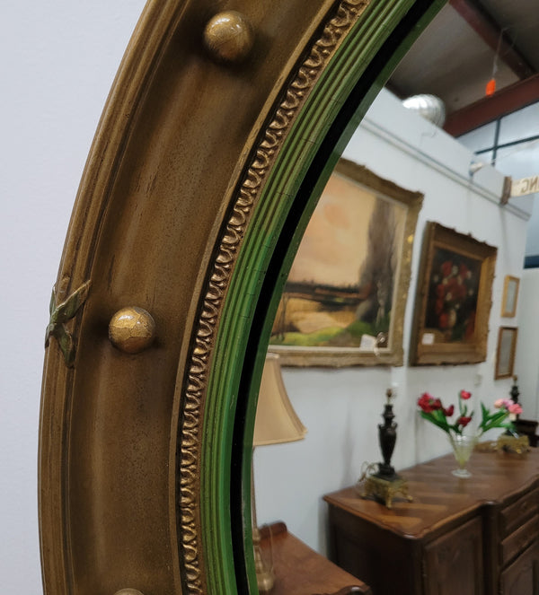 Large round French gilt framed convex mirror. It is a hard to find size with a total diameter of 67 cm. It has been sourced from France and is in good original condition.