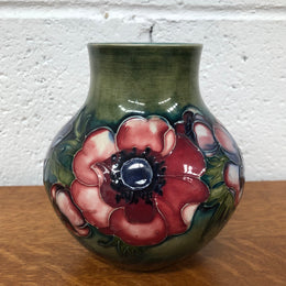 Anemone pattern hand-painted Moorcroft vase, in good condition.