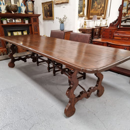 Amazing hard to find French Fruitwood Spanish style 3 meter dining table. Decorative iron work underneath and in good detailed original condition.