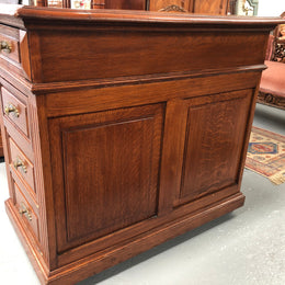 Antique french oak partners desk with plenty of drawers and cupboards and has an inbuilt Chubb Safe with keys. In very good condition.