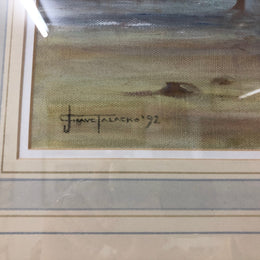 An oil on canvas on board framed and under glass a beautiful painting of a "Windy day at the beach Mornington" by Australian Artist Judy Talacko.