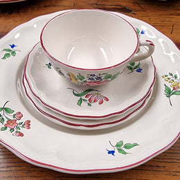A pretty French table setting made in France called Luneville. It consists of plates, cups, saucers, tea pot, milk jug, sugar bowl, tureens and cake plates a total of 53 pieces. Please view photos as they help form part of the descriptions.
