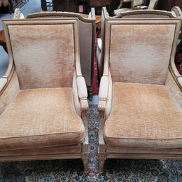 Pair of Louis XVI style painted arm chairs with carving & fluted legs. They have been sourced from France and the fabric is in good used original condition. Please view photos as they help form part of the description.