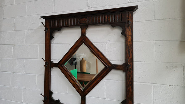 Beautiful Oak Antique Jacobean hall stand, with barley twist leg and a drawer for storage in very good original detailed condition condition.